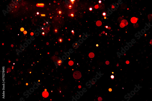 red bokeh on black background