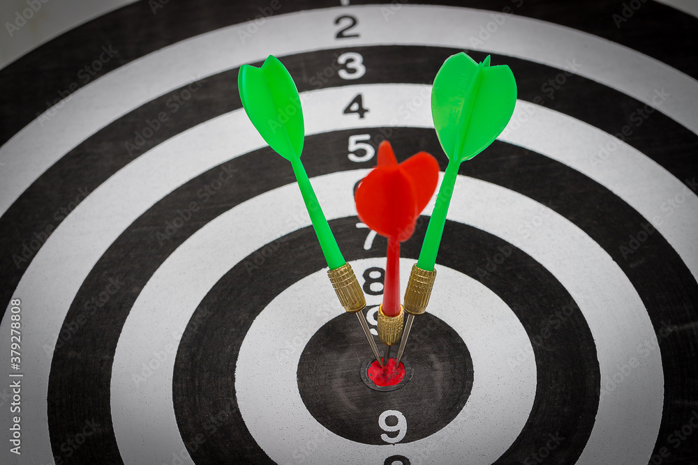 Success hitting target goal achievement three darts arrows in the target center business goal Success hitting target goal achievement three darts arrows in the target center business goal