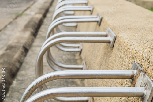 Bicycle racks in bicycle parking facility background.