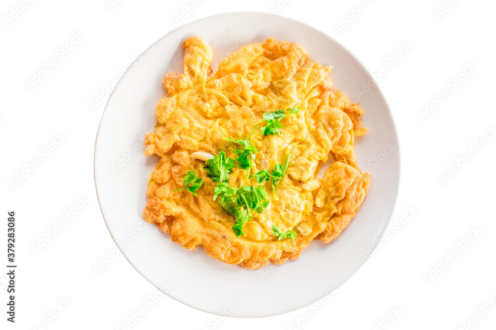 Above view of omelette with vegetable in ceramic plate isolated on white background. Omelet with onion it's egg fry popular traditional Thai Asian style food. Top view, Top-down Above view of omelette with vegetable in ceramic plate isolated on white background. Omelet with onion it's egg fry popular traditional Thai Asian style food. Top view, Top-down