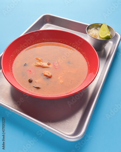 Bowl of Minestrone soup with beans and vegetables. Meat siup with a bowl of rice. Asian cuisine concept. photo