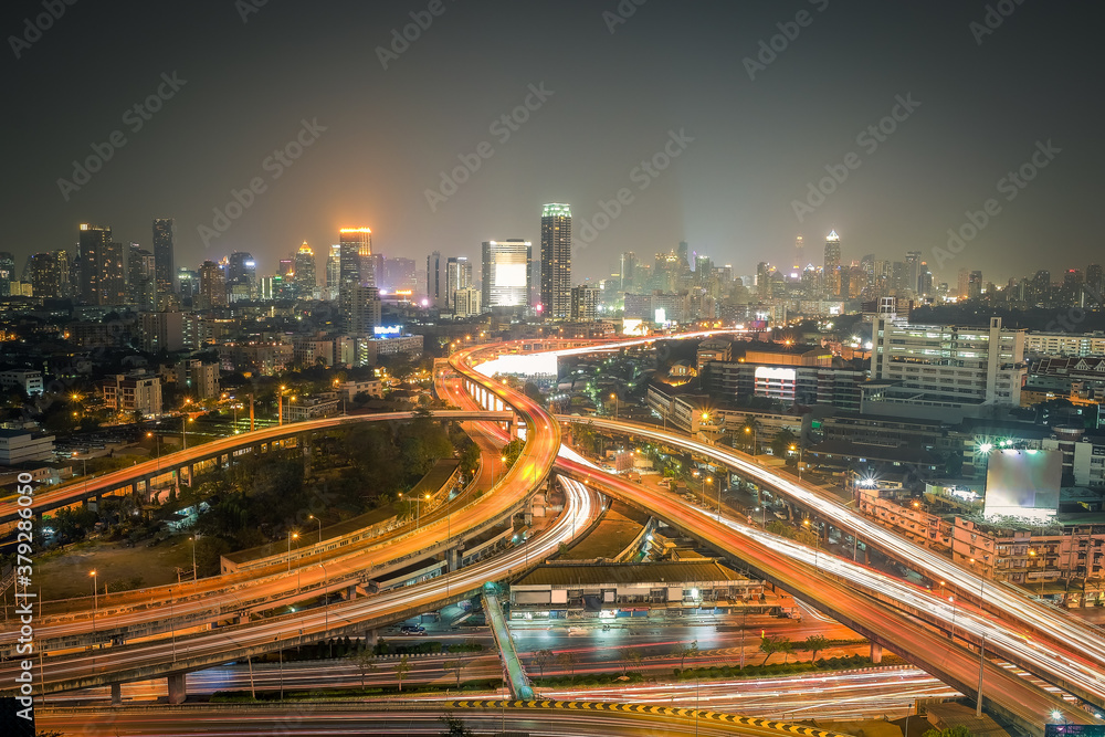 Obraz premium Aerial view of the modern buildings and skyscrapers at night of Bangkok City, Thailand.