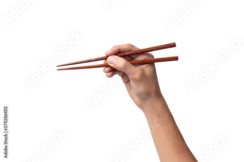 Hand man holding chopsticks isolated on a white background