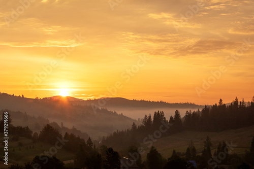 Beautiful sunrise in the Carpathian mountains in autumn
