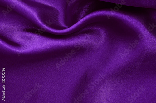 Purple fabric cloth texture for background and design art work, beautiful crumpled pattern of silk or linen.