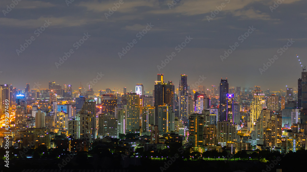 Panorama of cityscape in the night at Bangkok , Thailand. Beautiful building with lighting in the evening at Thailand.