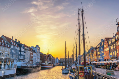 Copenhagen Denmark, sunset city skyline at Nyhavn harbour with colourful house