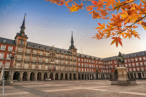 Madrid Spain, city skyline at Plaza Mayor with autumn leaf foliage