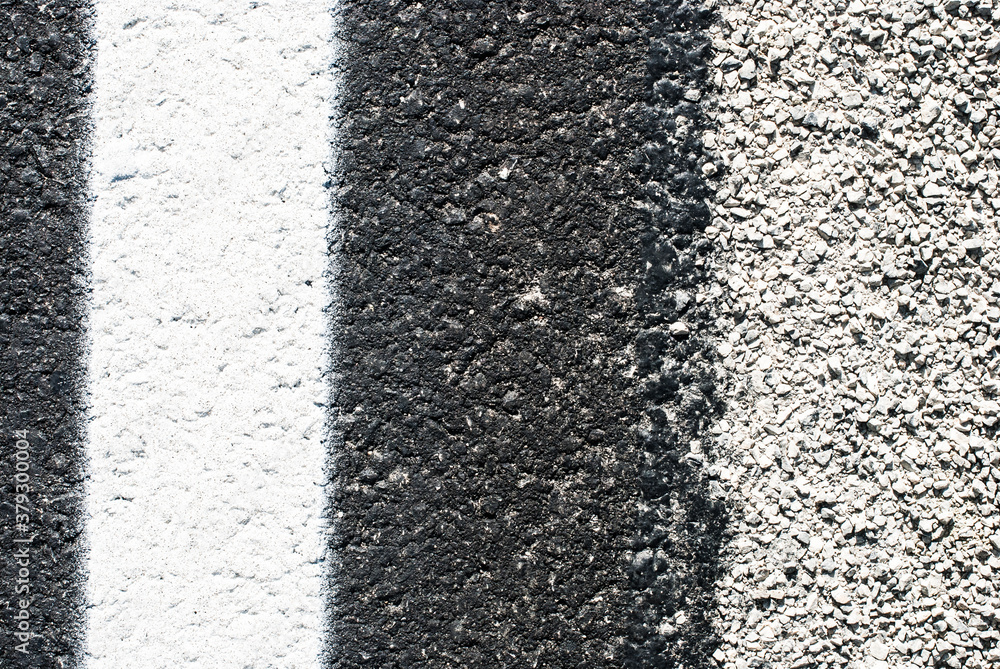 Fototapeta premium Rough road texture in full daylight. 