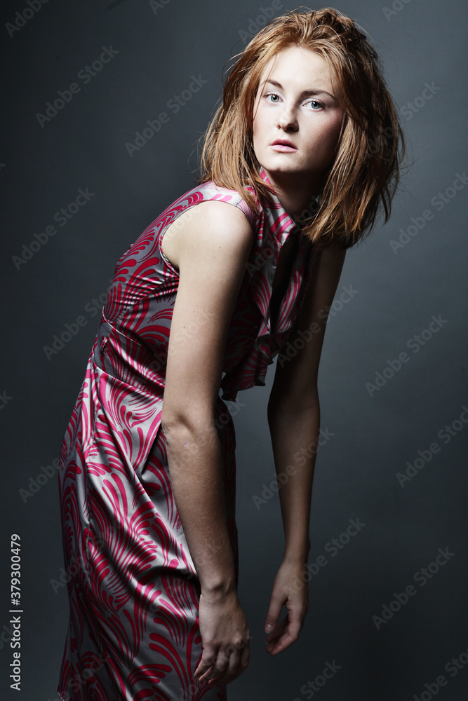 Fototapeta premium woman in elegant dress, studio shot