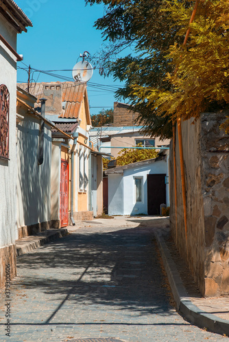 Quiet deserted street of the old city, Evpatoria, Crimea. photo