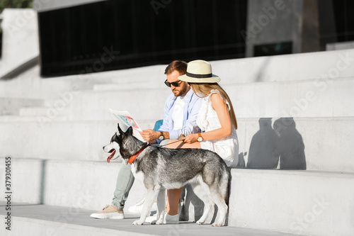Young couple with cute Husk...
