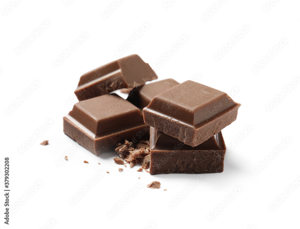 Pieces of delicious milk chocolate isolated on white Pieces of delicious milk chocolate isolated on white
