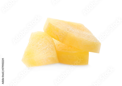 Slices of raw yellow carrot isolated on white