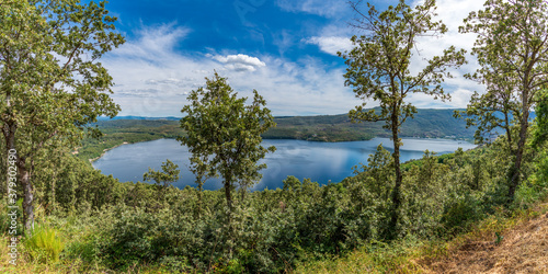 Top view of Sanabria lake under Oak Tree forest