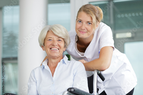 friendly nurse and senior patient