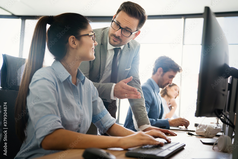 Startup business people group of programmer working as team to find solution to problem Startup business people group of programmer working as team to find solution to problem