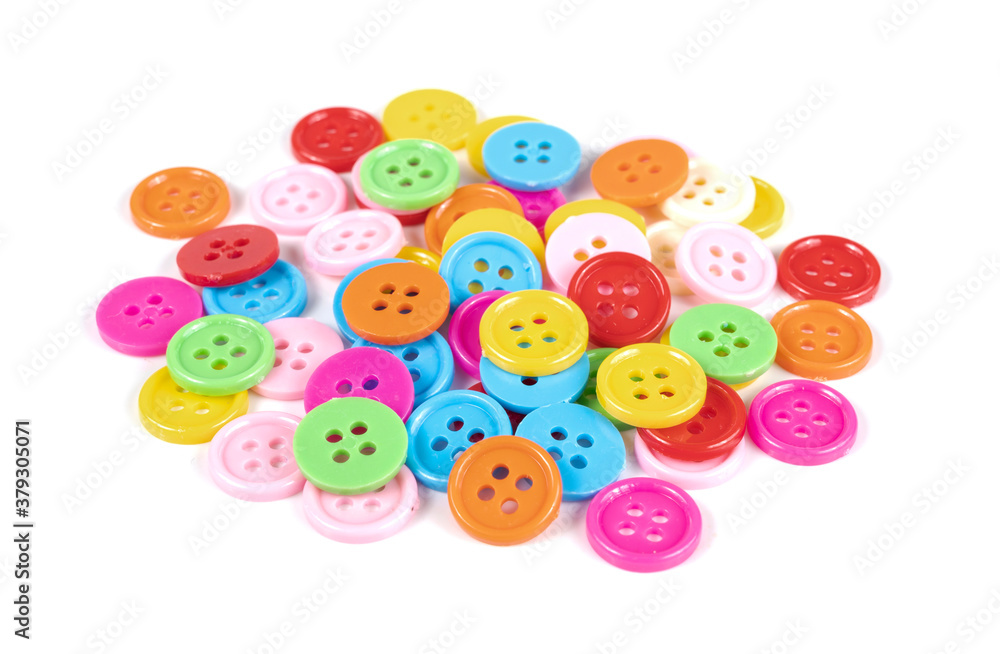 Many colorful plastic sewing buttons isolated on white Many colorful plastic sewing buttons isolated on white
