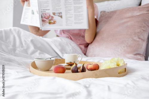 Tray with tasty breakfast o...