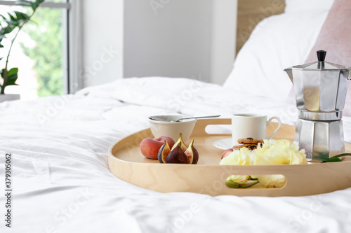 Tray with tasty breakfast o...