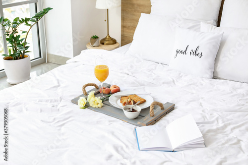 Tray with tasty breakfast a...