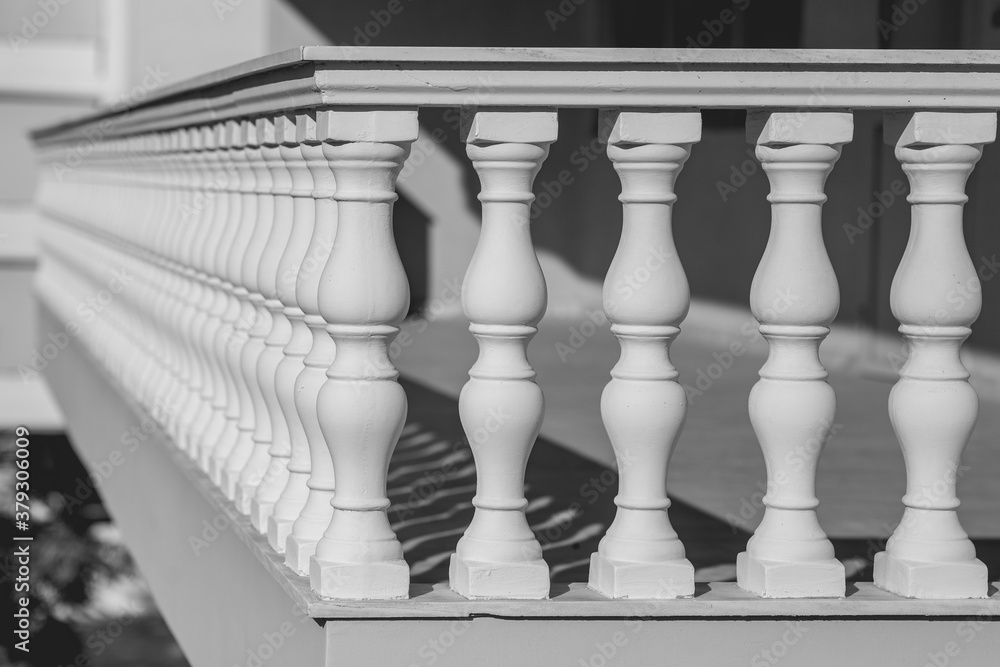 Stone balustrade of a balcony.  Black and white photo