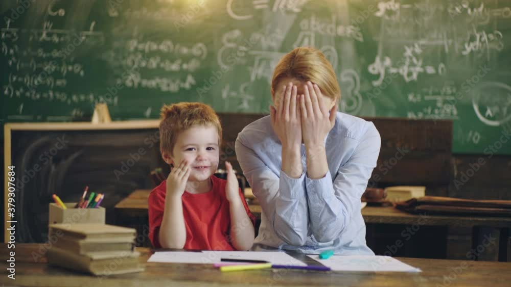 Mother an kid son in elementary school. Teacher playing with preschool children. Mother an kid son in elementary school. Teacher playing with preschool children.