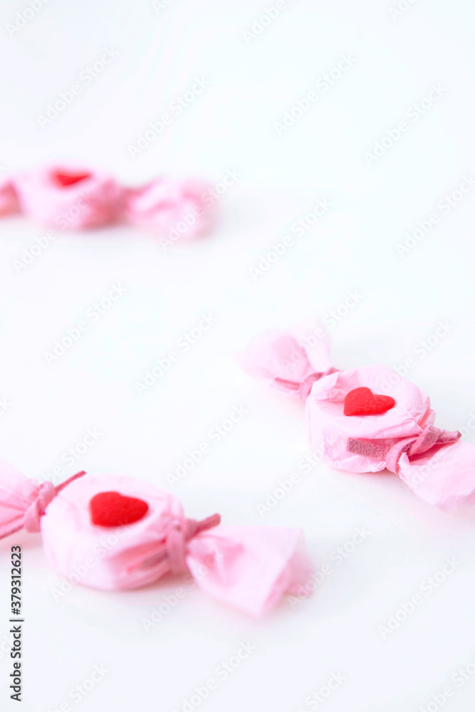 pink candies on white background pink candies on white background