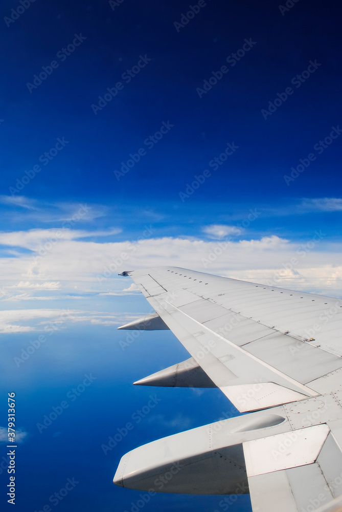 Obraz premium Clouds and sky from airplane window view