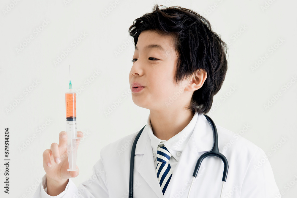boy in experiment gown boy in experiment gown