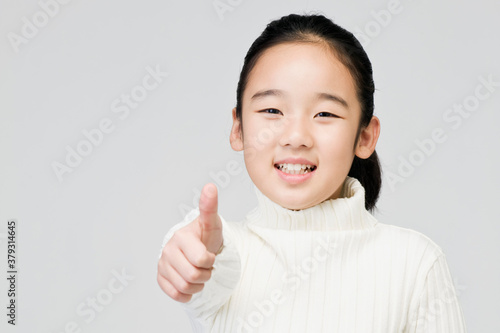 girl giving the thumb up
