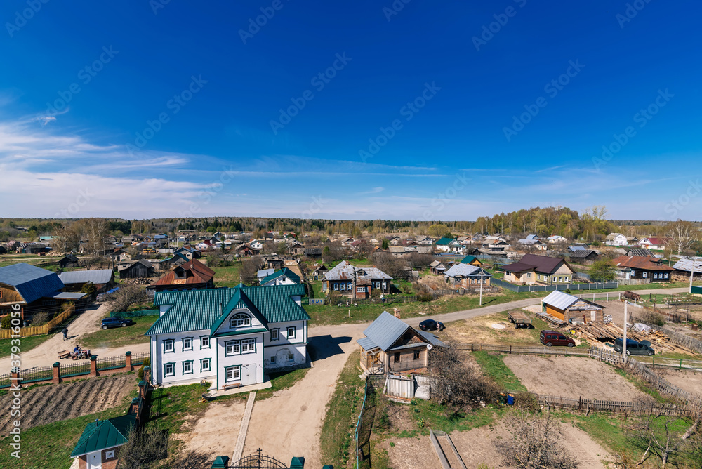 Top view of a rural village on a summer day