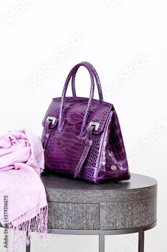 Photos bag and scarf on the table