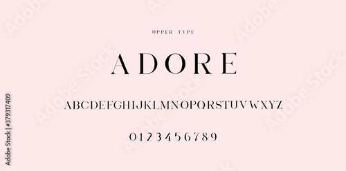 "Adore" font uppercase. EPS 10 Included. Stylish and Elegant alphabet. Numerals included. 