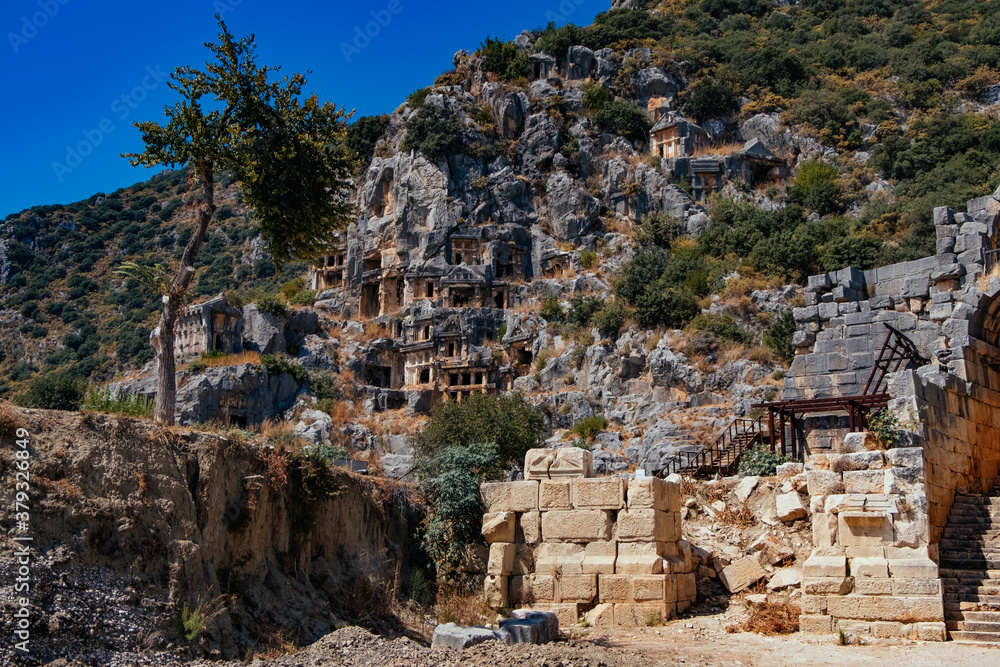 Ancient lycian rock tomb ruins in Demre, former Myra, Antalya, Turkey