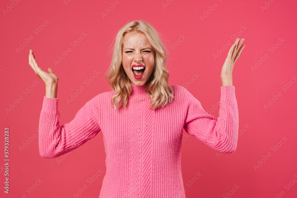 Image of angry blonde woman screaming at camera Image of angry blonde woman screaming at camera