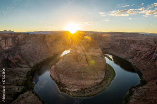 Nice View of Horseshoe bend sunset times during summer season . One of the most famous nature places in Arizona and locate near the town name Page , Arizona , United States of America