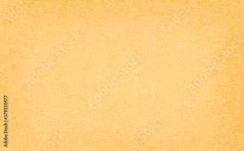 matte surface of old vintage paper with yellowed edges. Distressed old textured background for design.