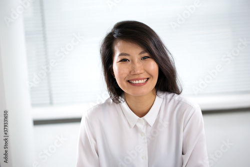 Portrait of beautiful asian business woman. Free Download Portrait of beautiful asian business woman. - GFXLoad