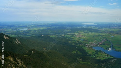 Panorama shot from the top of Herzogstand Mountain Peak to Munich,Germany. Wide shot showing Staffelsee, Kochelsee, Ammersee and Starnbergersee in background. Austrian German Border. photo