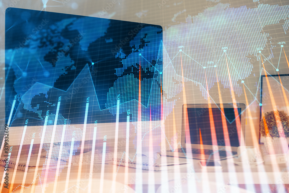 Forex market graph hologram and personal computer on background. Multi exposure. Concept of investment. Forex market graph hologram and personal computer on background. Multi exposure. Concept of investment.