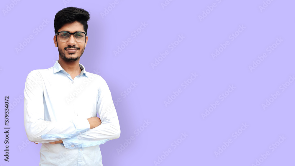 Indian male model standing and folded hands and smiling isolated Indian male model standing and folded hands and smiling isolated