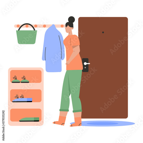 Woman in comfortable home outfit standing in cozy hallway