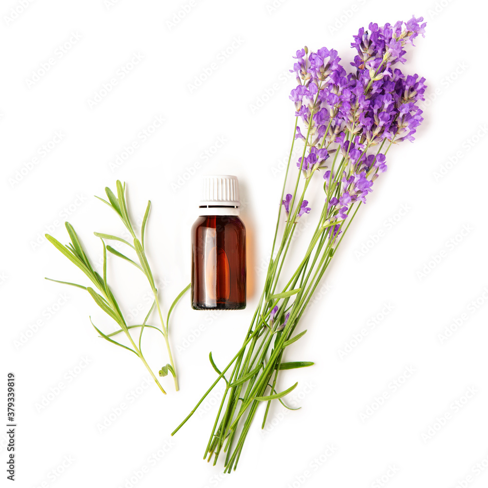 A bottle with essential oil and a bouquet of lavender on a white isolated background. Flat lay, mock up. A bottle with essential oil and a bouquet of lavender on a white isolated background. Flat lay, mock up.