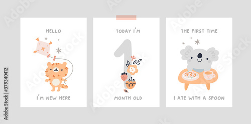 Baby milestone cards with cute cartoon little animal characters for newborn girl or boy. Baby shower print capturing all the special moments. Baby month anniversary card. Nursery prints