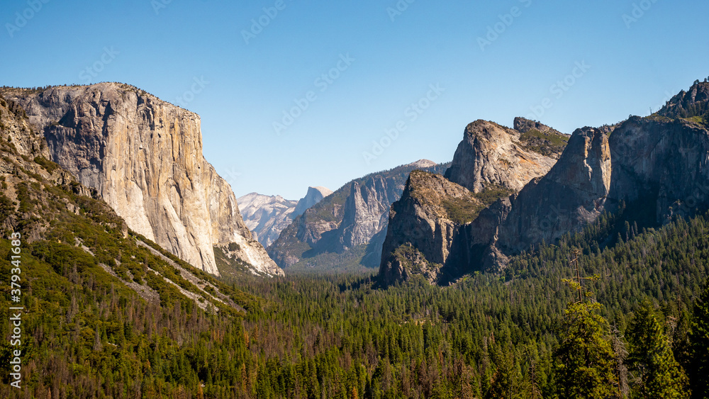 Nice view of Tunnel view in Yosemite National Park during summer season . One of the most famous and beautiful national park of the country locate in California , United States of America