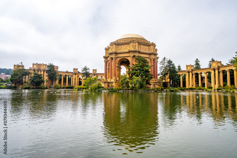 The classical Palace of fine art in San Fran during summer season late morning . The most famous bridge in the heart of San Francisco , California , United Staes of America