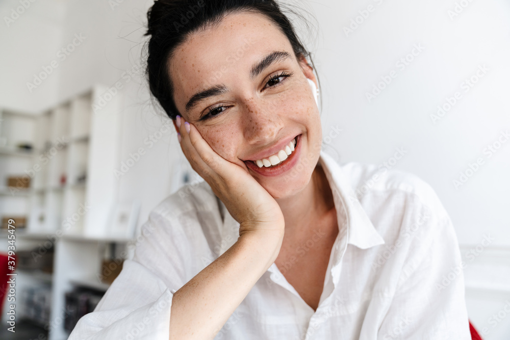Close up of a happy young woman on a video call