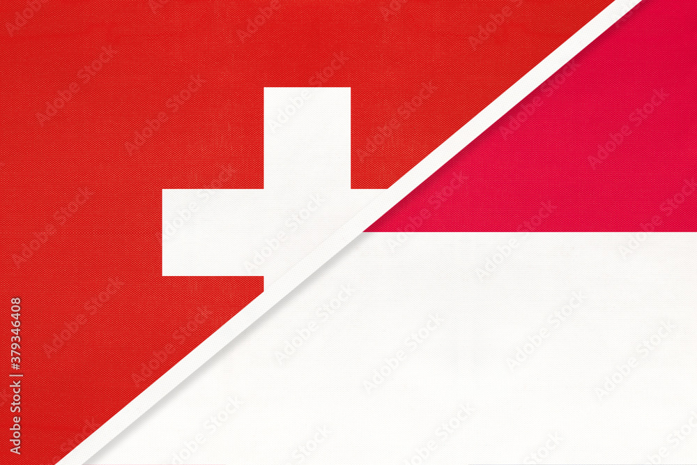 Fototapeta premium Switzerland and Monaco, symbol of national flags from textile. Championship between two countries.