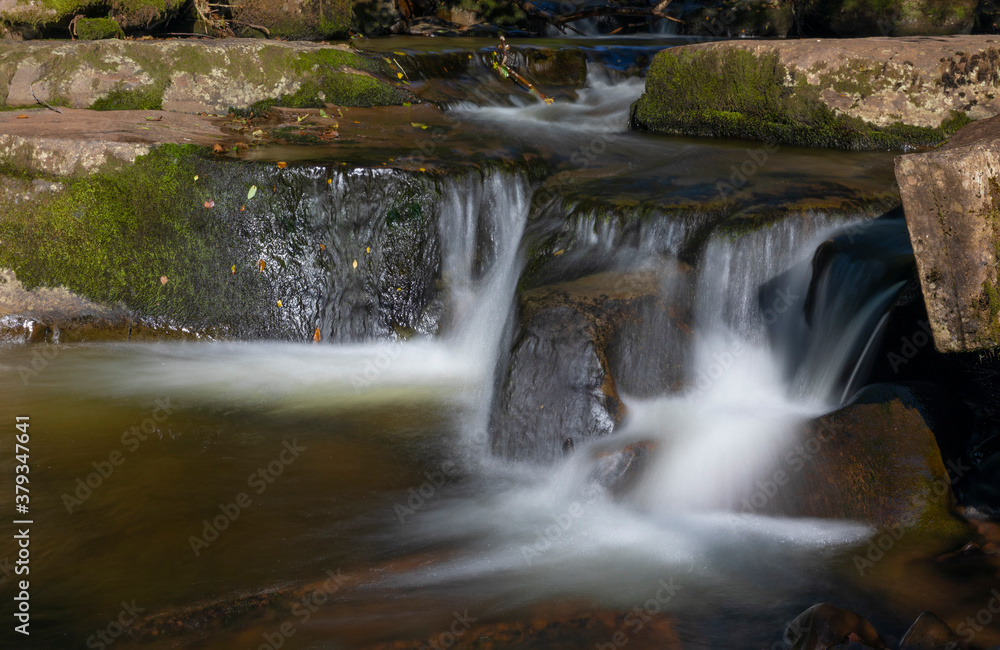 Obraz premium Lower Blaen-y-Glyn waterfalls in the Brecon Beacons, Wales, UK